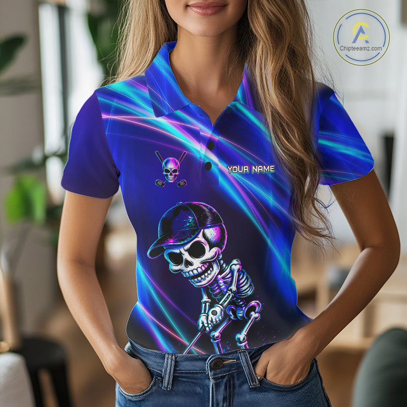 Female golfer wearing skeleton golf polo with glowing neon artwork, unique ladies golf apparel expressing confidence and individuality.