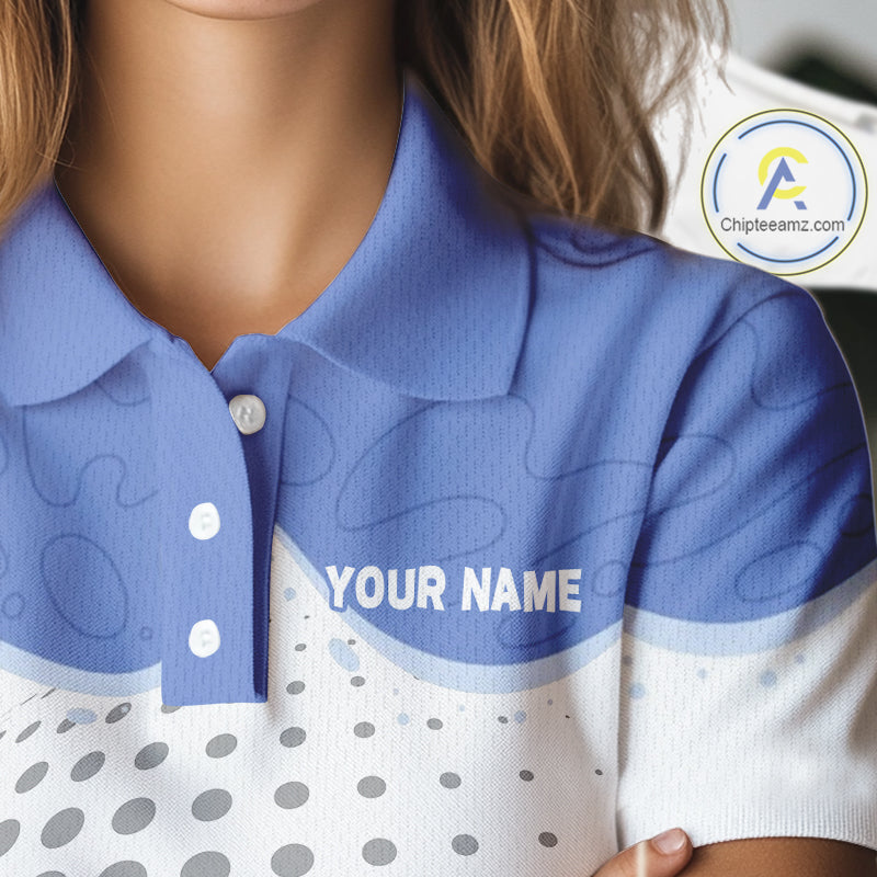 Female golfer wearing Summer Crab golf polo, tropical golf clothing, vacation golf outfit, custom golf apparel, beach golf style