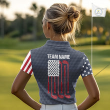 Load image into Gallery viewer, Female golfer wearing custom patriotic golf polo with grey golf ball pattern, perfect for ladies golf league, Memorial Day tournaments, Independence Day golf outings, symbolizing freedom, confidence and teamwork.