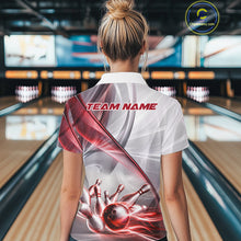 Load image into Gallery viewer, Female bowler wearing white and red smoke bowling jersey during tournament play, performance bowling apparel for league champions, sports enthusiasts and competitive athletes, symbolizing confidence, resilience and success.