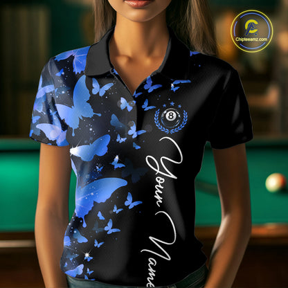 Female billiard player wearing blue lightning butterfly jersey during billiard tournament, premium sports apparel for artistic competitors, nature enthusiasts and league champions, symbolizing calm confidence, determination and elite performance.