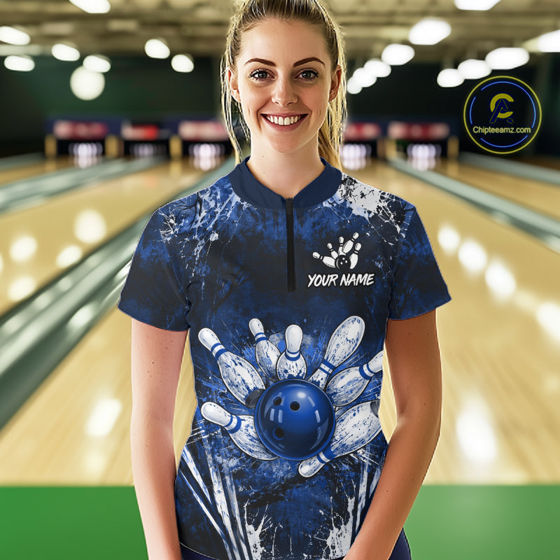 Woman wearing white blue splatter bowling ball shirt custom bowling apparel