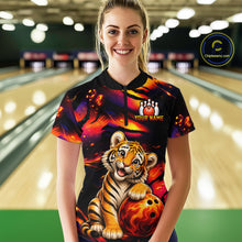 Load image into Gallery viewer, Female bowler wearing tiger fire bowling jersey during league competition, personalized bowling apparel symbolizing power, resilience and competitive spirit.