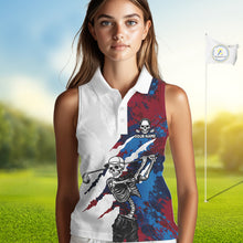 Load image into Gallery viewer, Female golfer wearing red blue splatter skull golf polo shirt, custom skull golf apparel, women's golf outfit