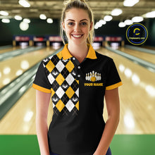 Load image into Gallery viewer, Woman wearing a bowling shirt with a checkered design and logo in a bowling alley.