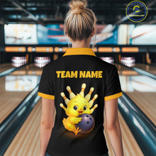 Load image into Gallery viewer, Person wearing a black bowling shirt with a cartoon chicken holding a bowling ball and 'TEAM NAME' text in a bowling alley.