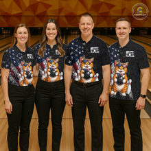 Load image into Gallery viewer, Four people wearing matching shirts with a cat american flag design on a bowling alley.