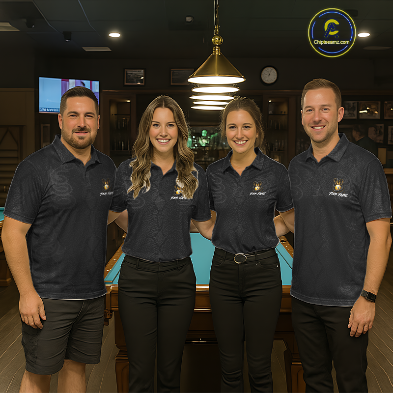 Four people in matching dark polo shirts standing in a bar setting.